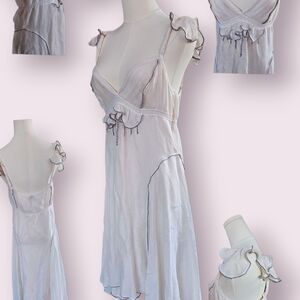 Asymmetrical White Dress with Ruffle Details